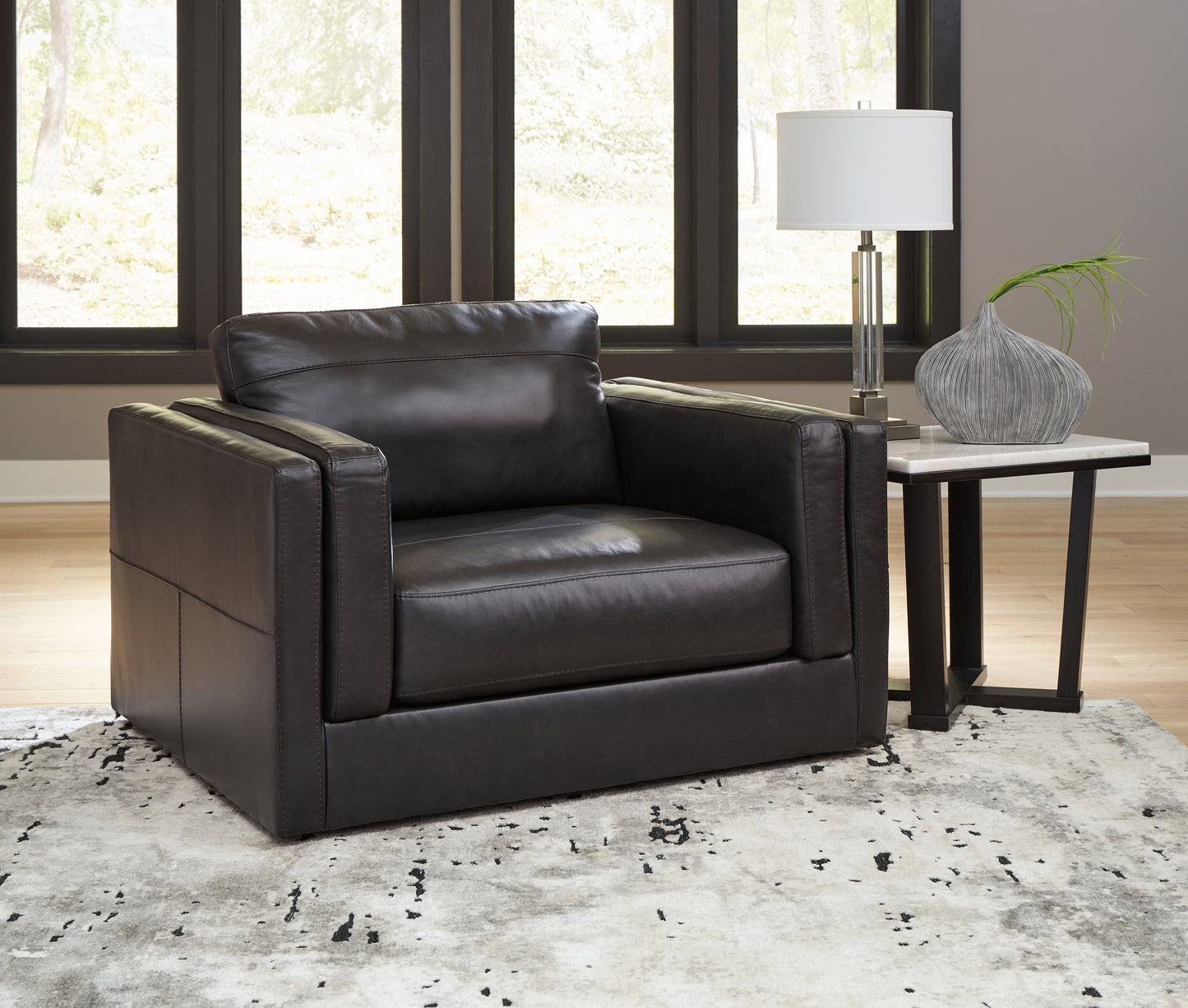 Bradenton Furniture Outlet - Ashley Furniture - Amiata Living Room - Chair and a Half / Onyx - 5740523