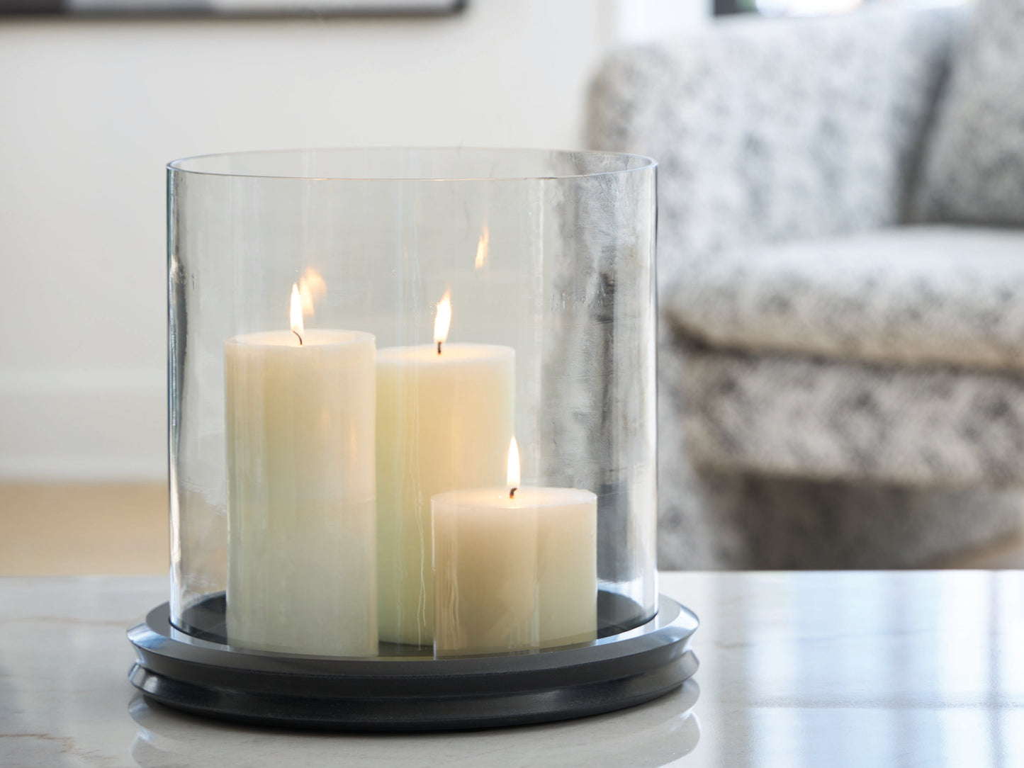 Bradenton Furniture Outlet - Ashley Furniture - Saskia Candle Holder - Candle Holder / Clear/Black - A2000846