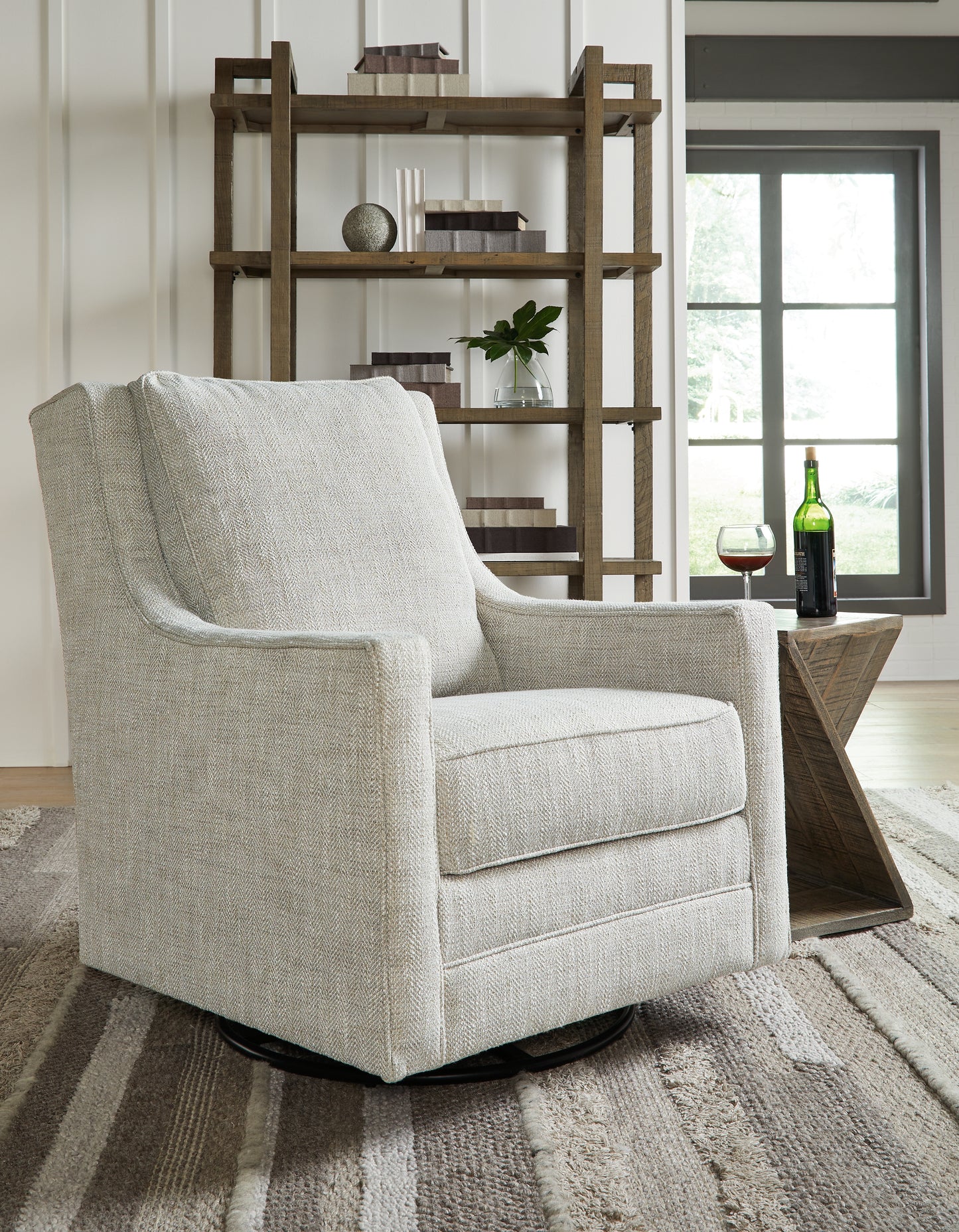Bradenton Furniture Outlet - Ashley Furniture - Kambria Swivel Glider Accent Chair - Swivel Glider Accent Chair / Fog - A3000265