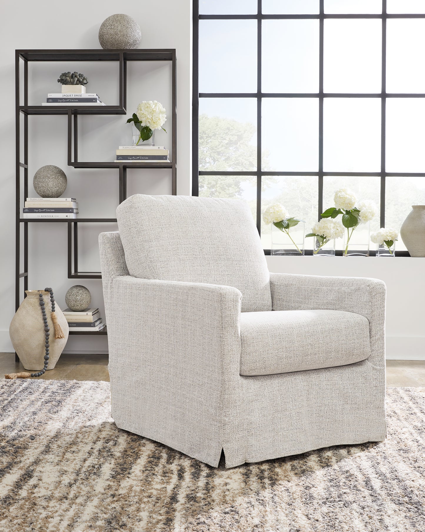 Bradenton Furniture Outlet - Ashley Furniture - Nenana Next-Gen Nuvella Swivel Glider Accent Chair - Swivel Glider Accent Chair / Stone - A3000644