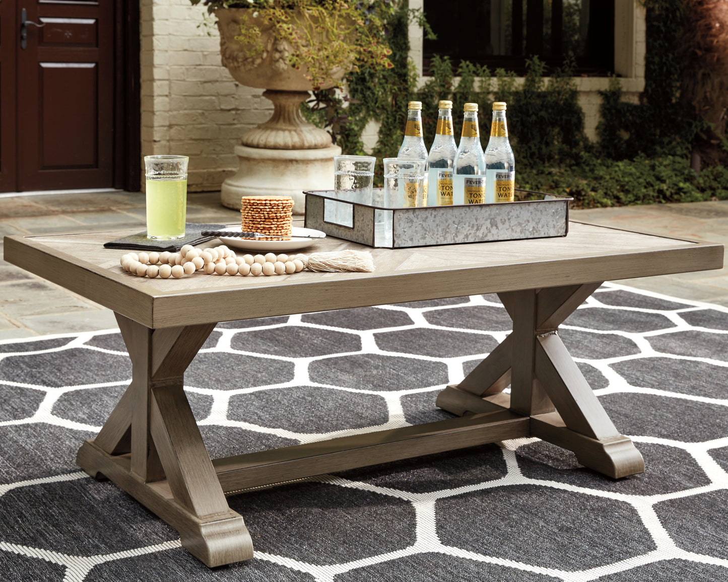 Bradenton Furniture Outlet - Ashley Furniture - Beachcroft Outdoor - Rectangular Cocktail Table / Beige - P791-701