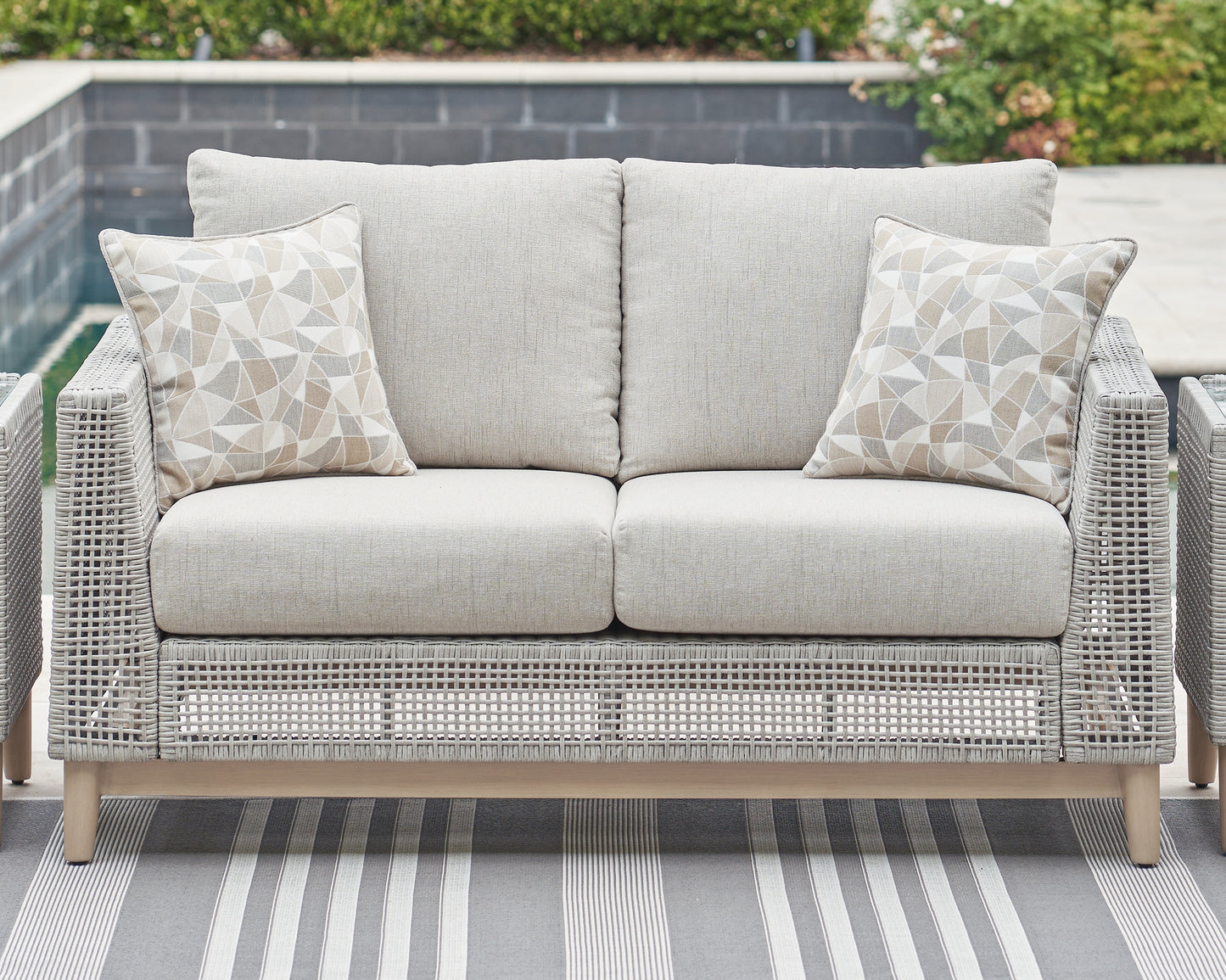 Bradenton Furniture Outlet - Ashley Furniture - Seton Creek Outdoor - Loveseat w/Cushion / Gray - P798-835