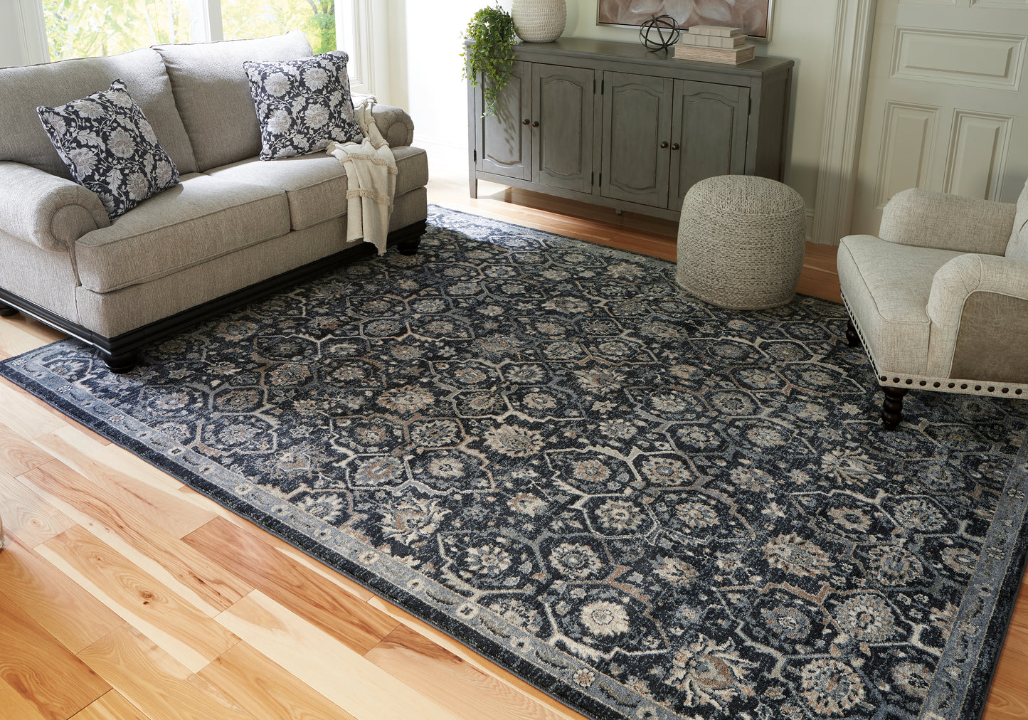 Bradenton Furniture Outlet - Ashley Furniture - Hilcott Rug - 7'10" x 10'6" Rug / Blue/Cream/Brown - R406111