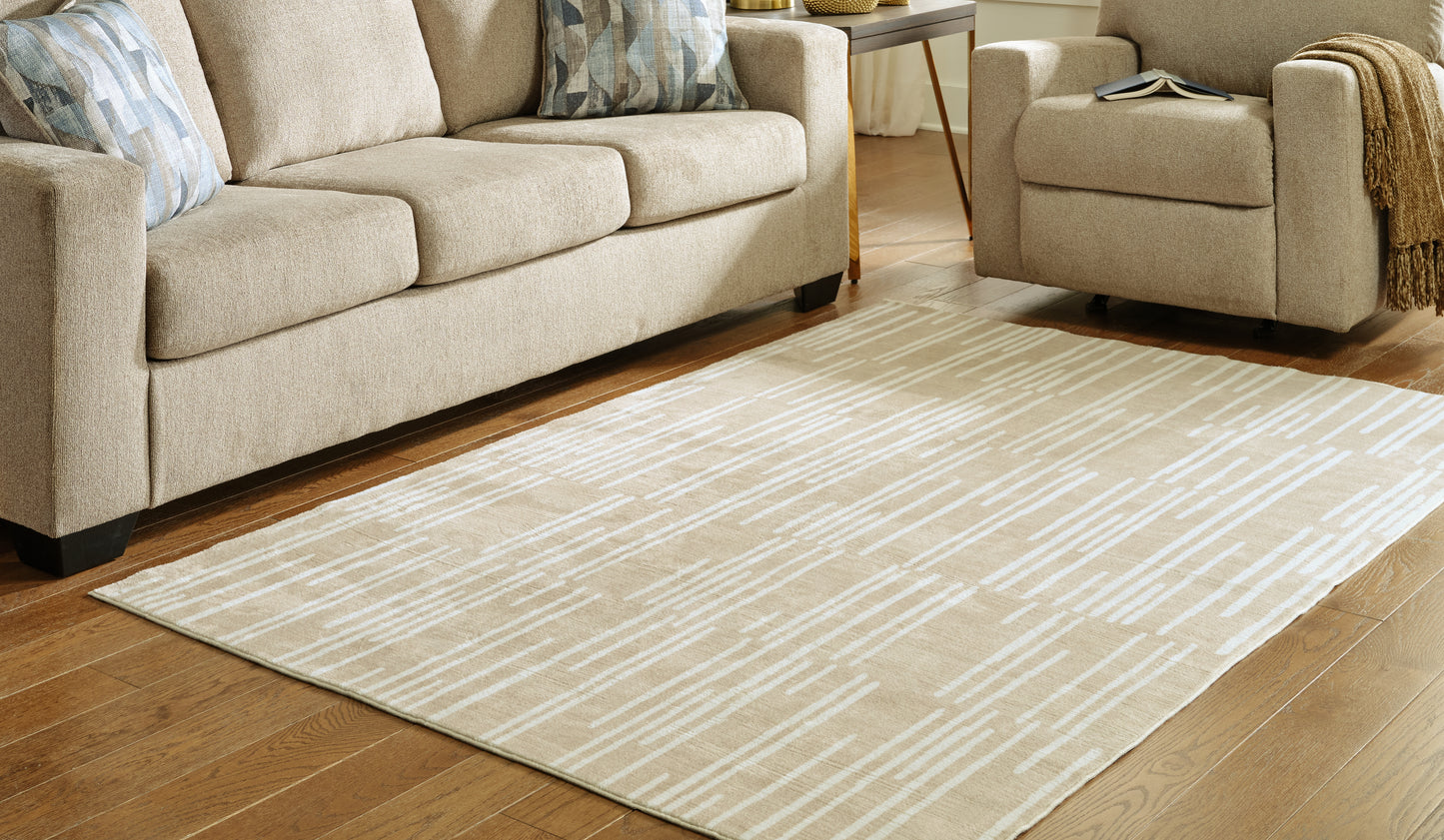 Bradenton Furniture Outlet - Ashley Furniture - Ardenville Rug - 5' x 7'1" Washable Rug / Tan/Cream - R406212