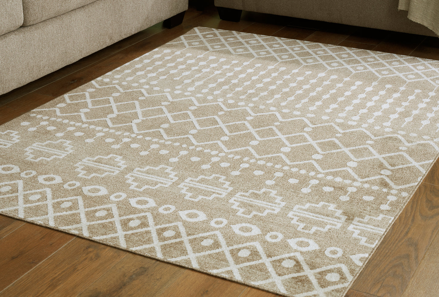 Bradenton Furniture Outlet - Ashley Furniture - Bunchly Rug - 4'11" x 7'2" Washable Rug / Tan/Brown/Cream - R406222