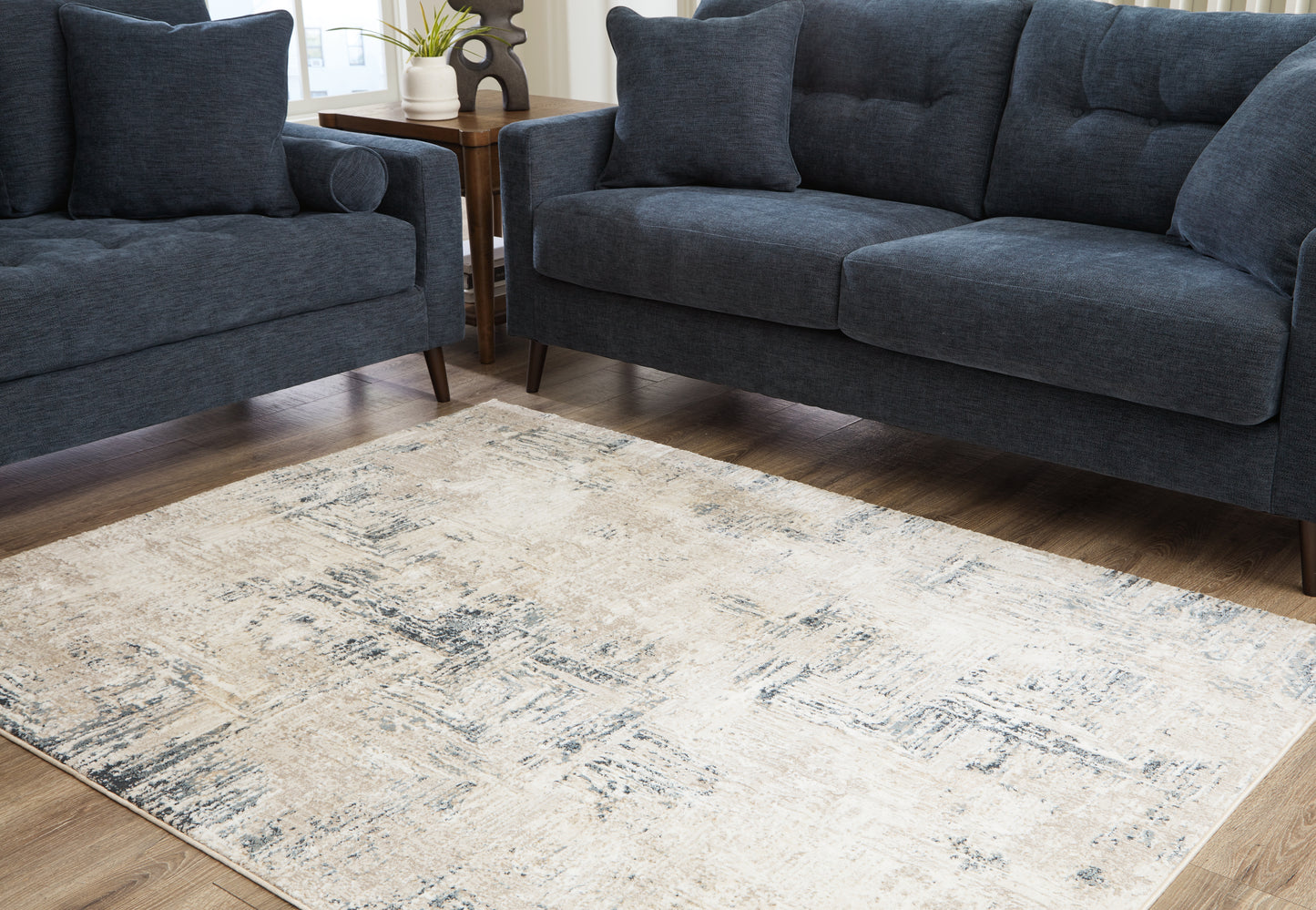 Bradenton Furniture Outlet - Ashley Furniture - Gentor Rug - 5' x 7' Rug / Blue/Ivory - R406522