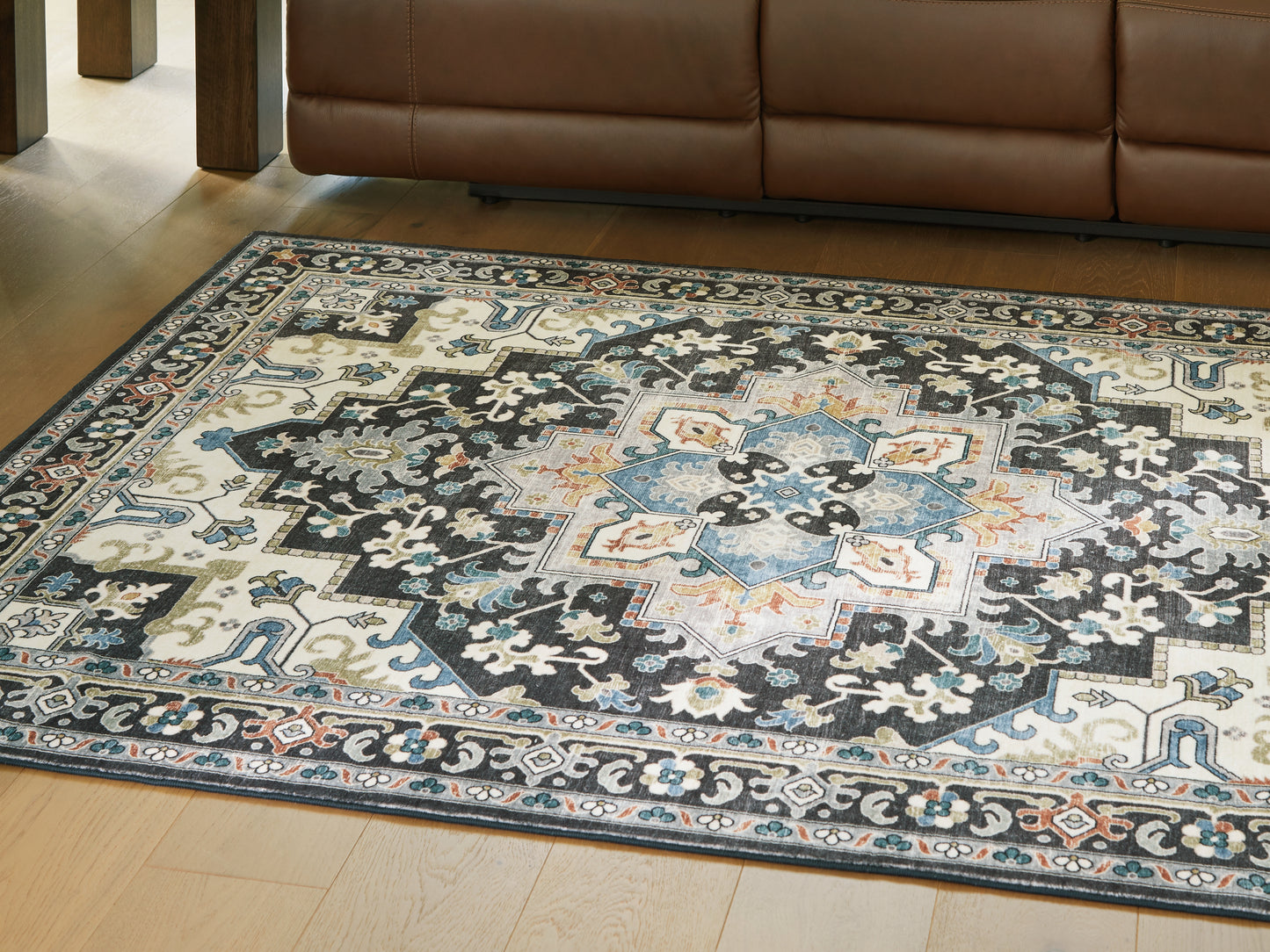 Bradenton Furniture Outlet - Ashley Furniture - Leningston Rug - 8' x 10' Washable Rug / Black/Cream/Blue - R407061
