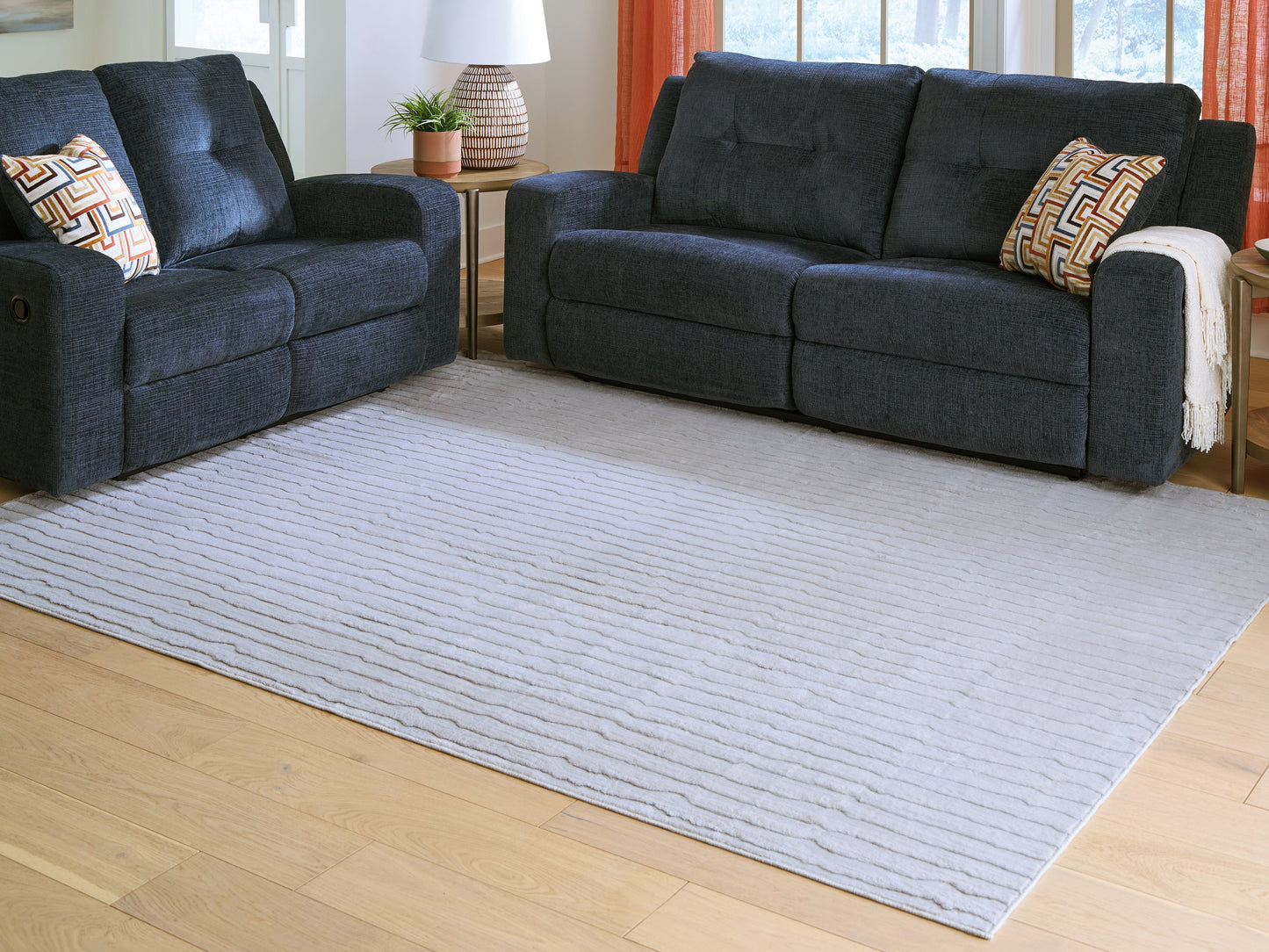 Bradenton Furniture Outlet - Ashley Furniture - Worthley Rug - Washable 8' x 10' Area Rug / Gray - R407451