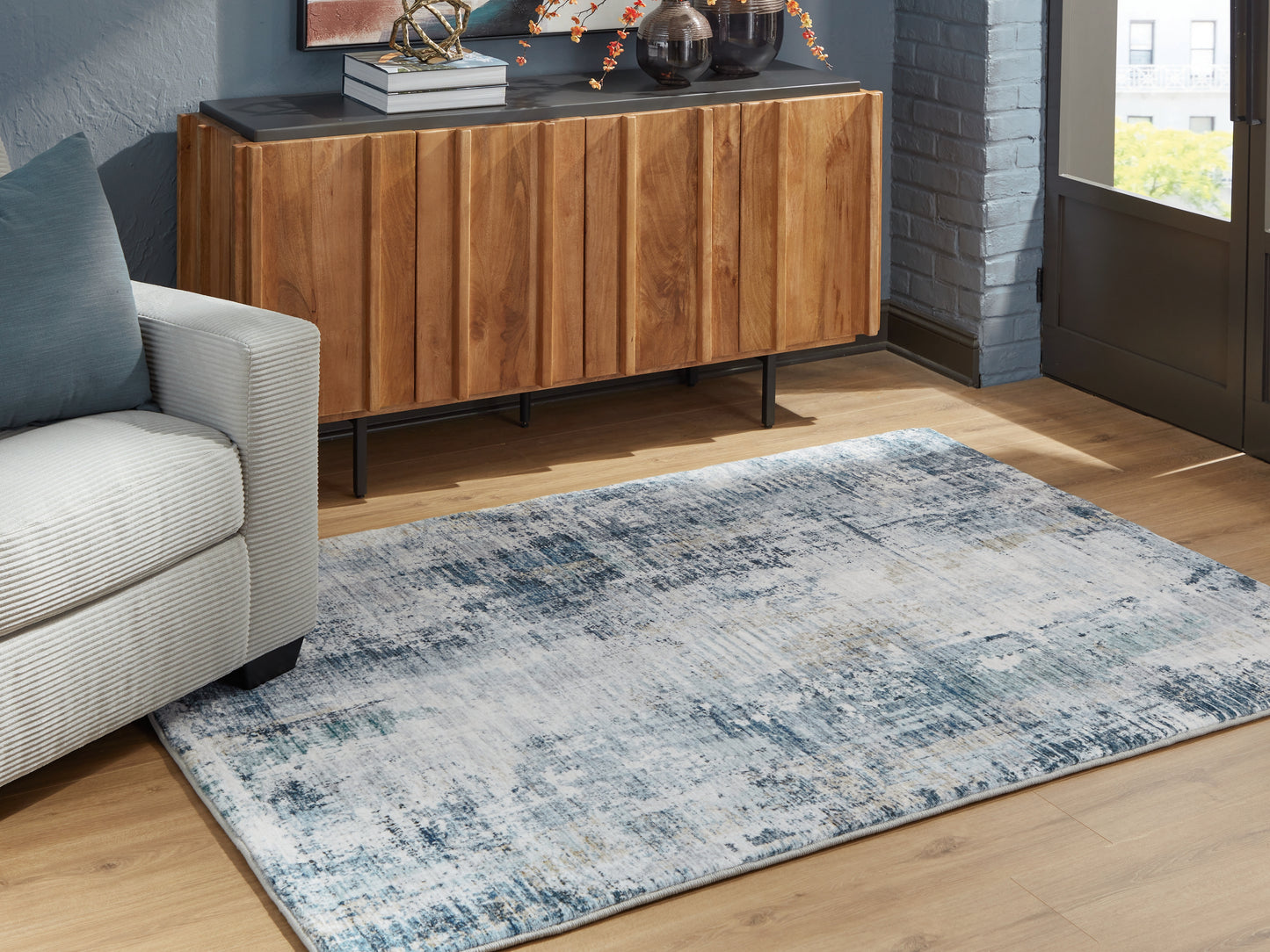 Bradenton Furniture Outlet - Ashley Furniture - Arlenmont Rug - 5' x 7' Area Rug / Blue/White/Brown - R407482