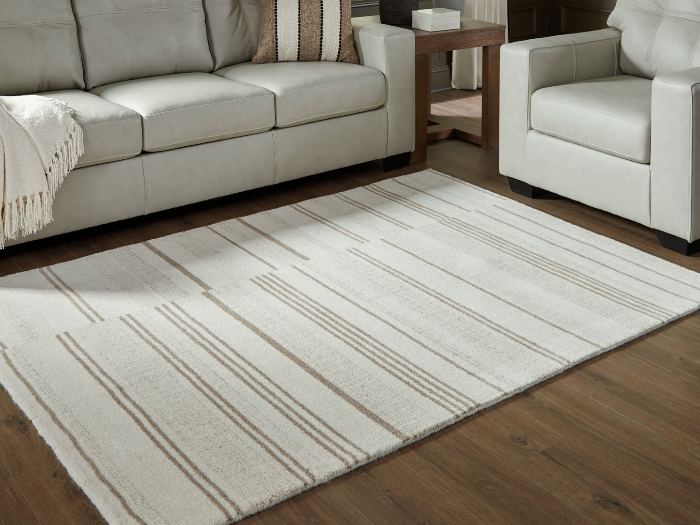 Bradenton Furniture Outlet - Ashley Furniture - Gadence Rug - 5' x 7' Area Rug / Ivory/Tan - R407642