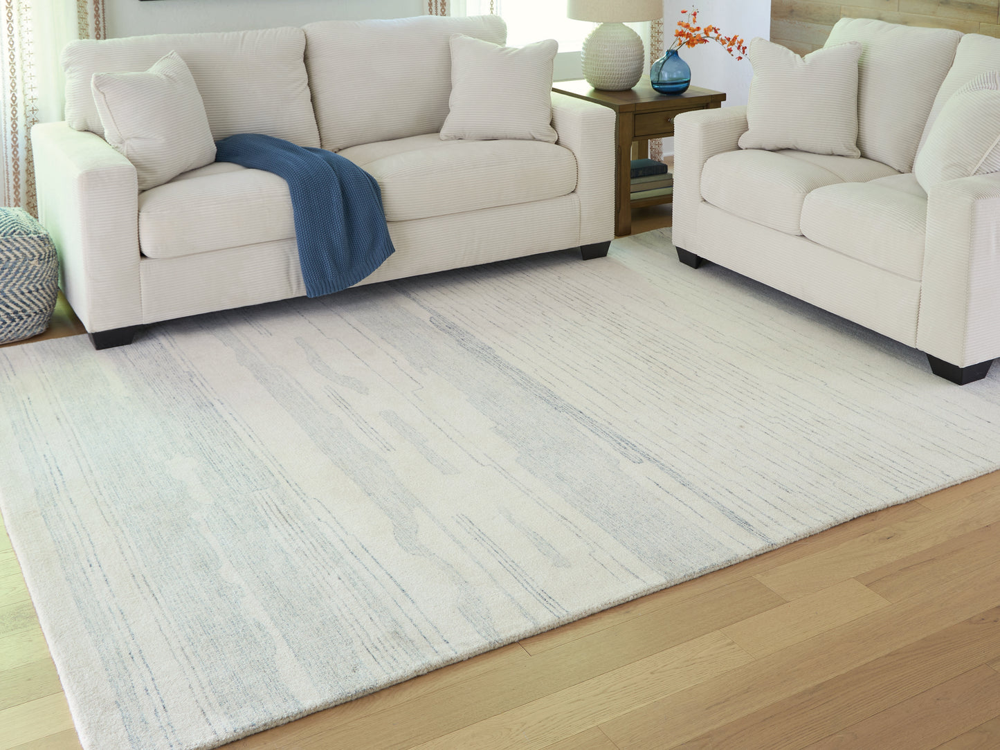 Bradenton Furniture Outlet - Ashley Furniture - Genemost Rug - 7'8" x 10' Area Rug / Ivory/Blue - R407841