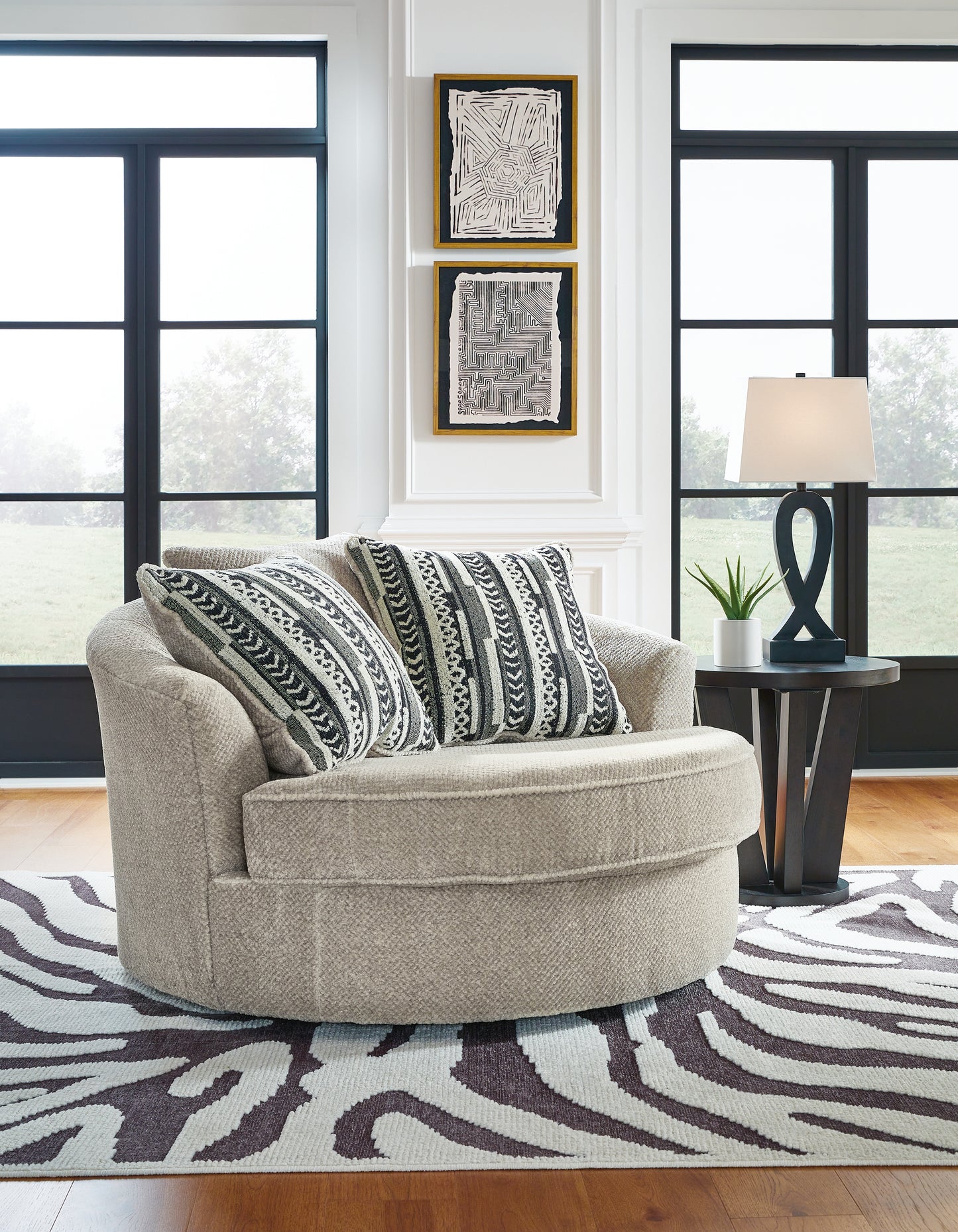 Bradenton Furniture Outlet - Ashley Furniture - Calnita Living Room - Oversized Swivel Accent Chair / Sisal - 2050221