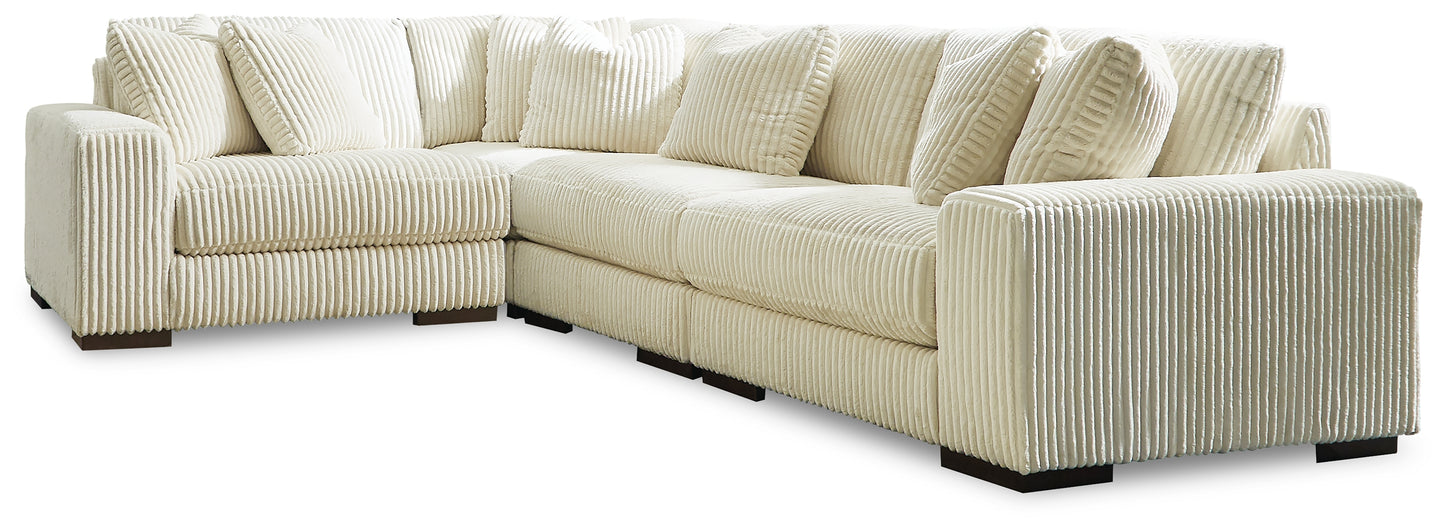 Bradenton Furniture Outlet - Ashley Furniture - Lindyn Sectional - RAF 4-Piece Sectional / Ivory - 21104S8