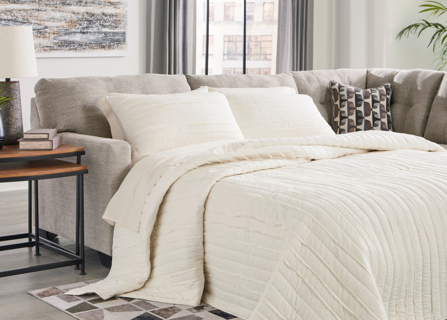 Bradenton Furniture Outlet - Ashley Furniture - Mahoney Sectional - 2-Piece Sleeper Sectional with Chaise / Pebble - 31004S4