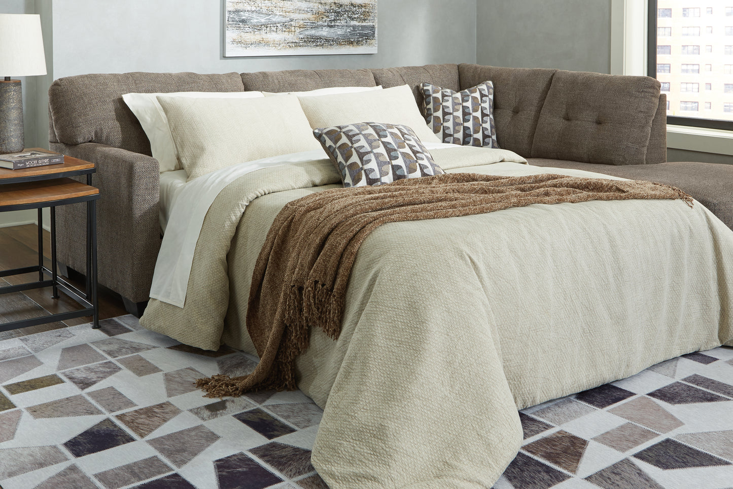 Bradenton Furniture Outlet - Ashley Furniture - Mahoney Sectional - 2-Piece Sleeper Sectional with Chaise / Chocolate - 31005S4