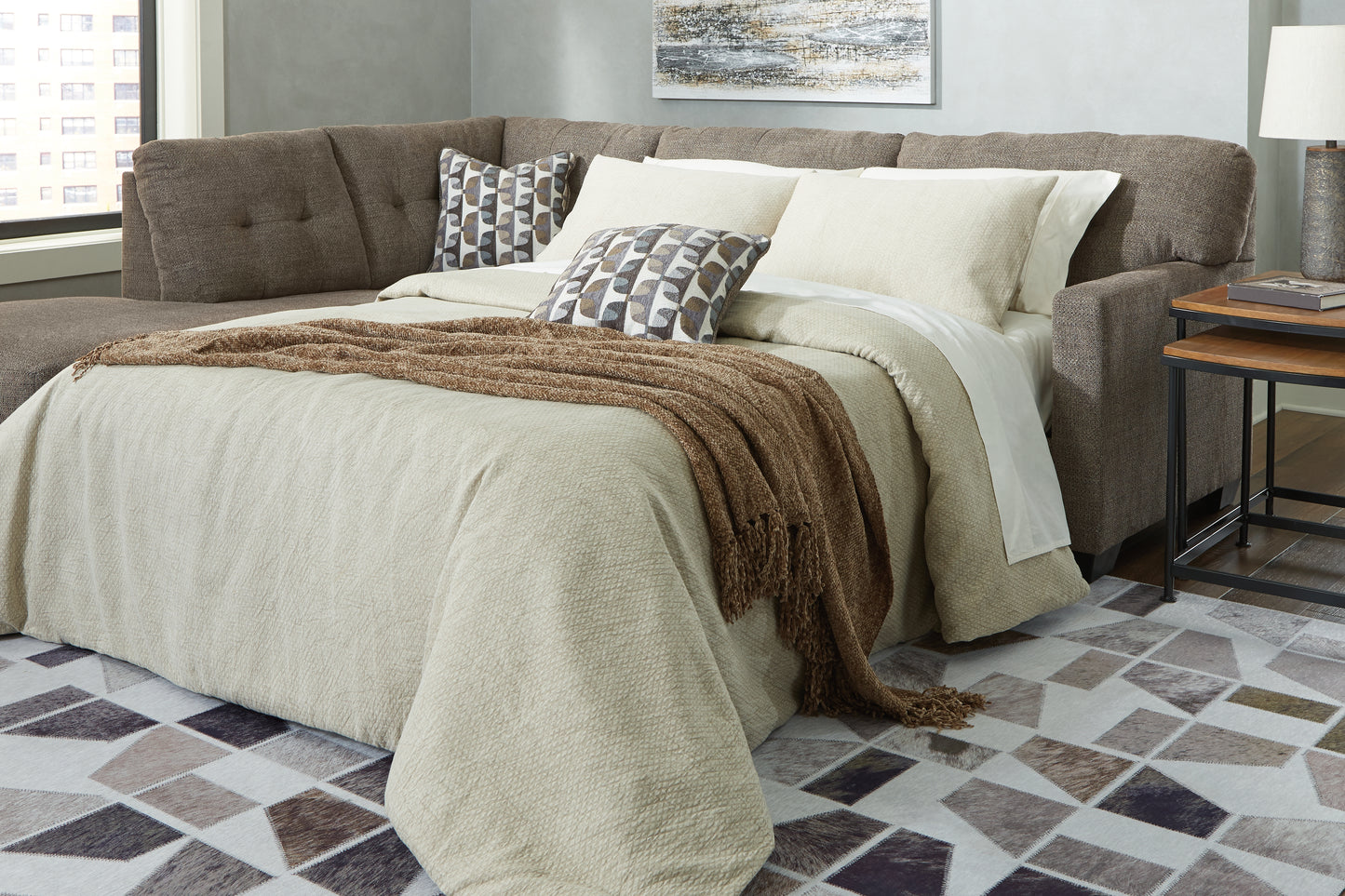 Bradenton Furniture Outlet - Ashley Furniture - Mahoney Sectional - RAF 2-Piece Sleeper Sectional with Chaise / Chocolate - 31005S3