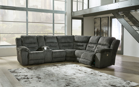 Bradenton Furniture Outlet - Ashley Furniture - Nettington Sectional - 3-Piece Power Reclining Sectional / Smoke - 44101S1