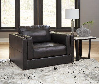 Bradenton Furniture Outlet - Ashley Furniture - Amiata Living Room - Chair and a Half / Onyx - 5740523