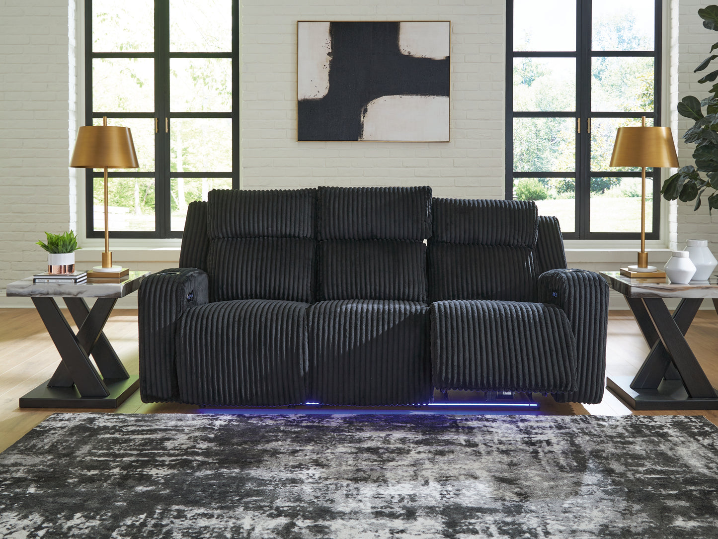 Bradenton Furniture Outlet - Ashley Furniture - Forest Lake Living Room - PWR REC Sofa with ADJ Headrest / Black - PC6420215