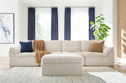 Bradenton Furniture Outlet - Ashley Furniture - Fannin Sectional - RAF 4-Piece Sectional with Ottoman / Ivory - PC84304S1