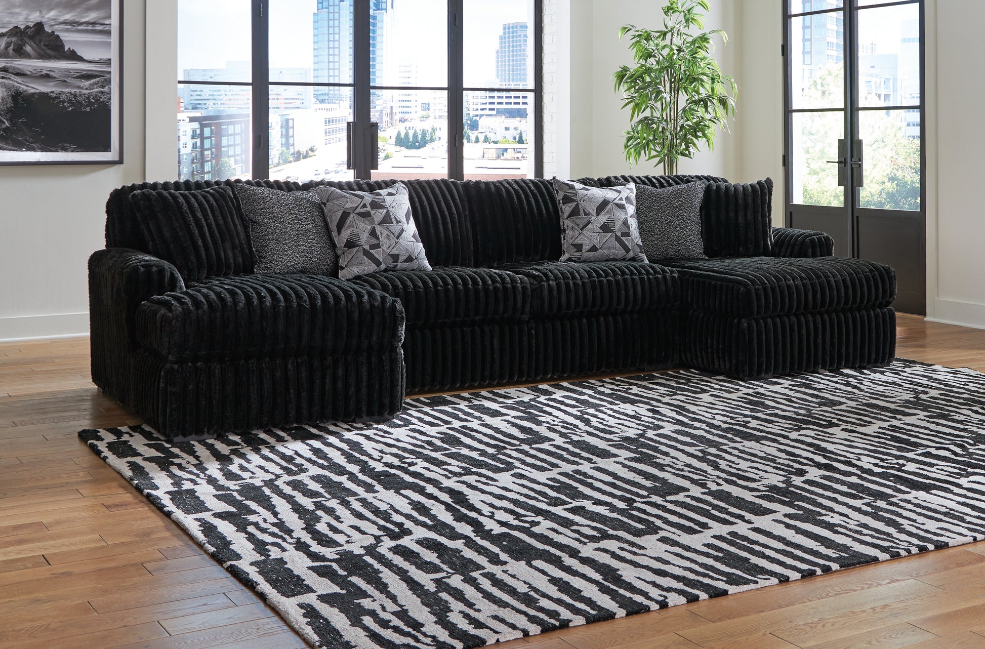 Bradenton Furniture Outlet - Ashley Furniture - Midnight-Madness Sectional - LAF 3-Piece Sectional with Chaise / Onyx - 98103S9