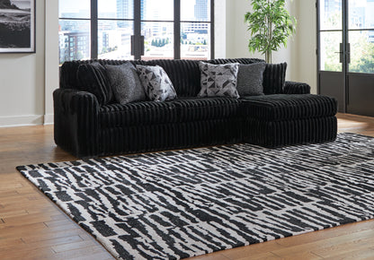 Bradenton Furniture Outlet - Ashley Furniture - Midnight-Madness Sectional - LAF 2-Piece Sectional Sofa with Chaise / Onyx - 98103S2