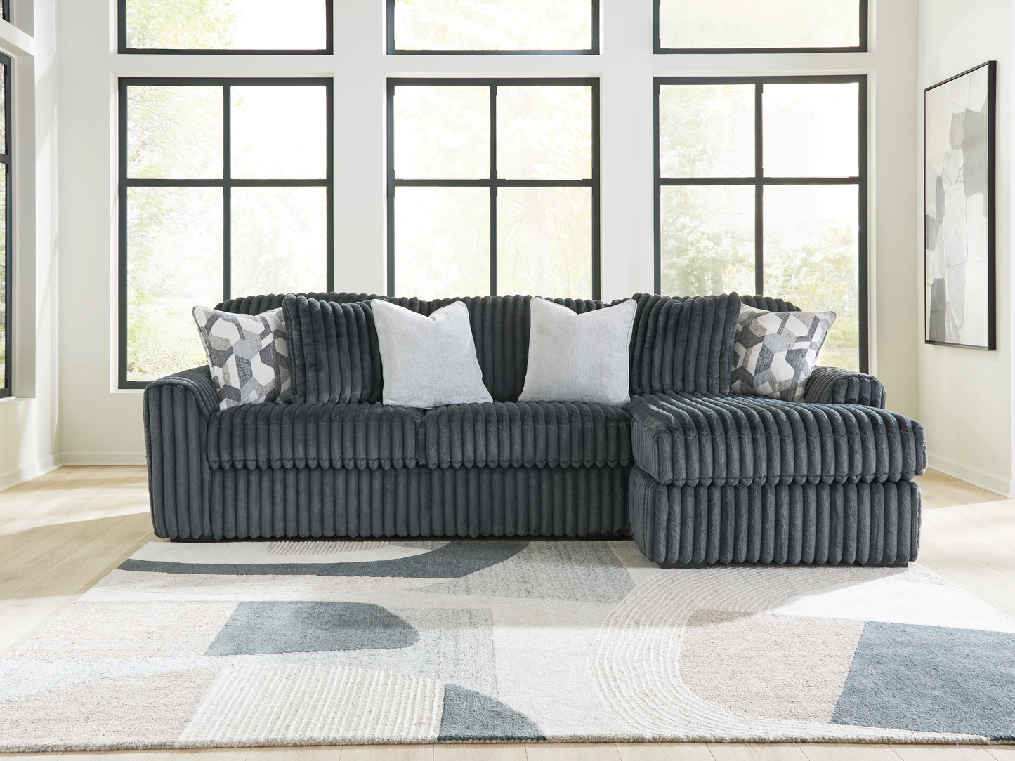 Bradenton Furniture Outlet - Ashley Furniture - Midnight-Madness Sectional - LAF 2-Piece Sectional Sofa Chaise / Gunmetal - 98105S3