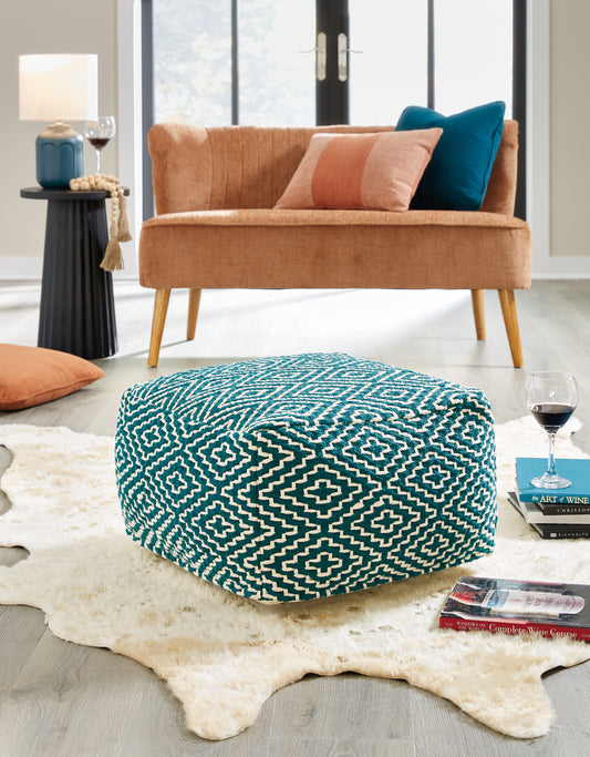 Bradenton Furniture Outlet - Ashley Furniture - Brynnsen Pouf - Pouf / Rust/Ivory - A1001056