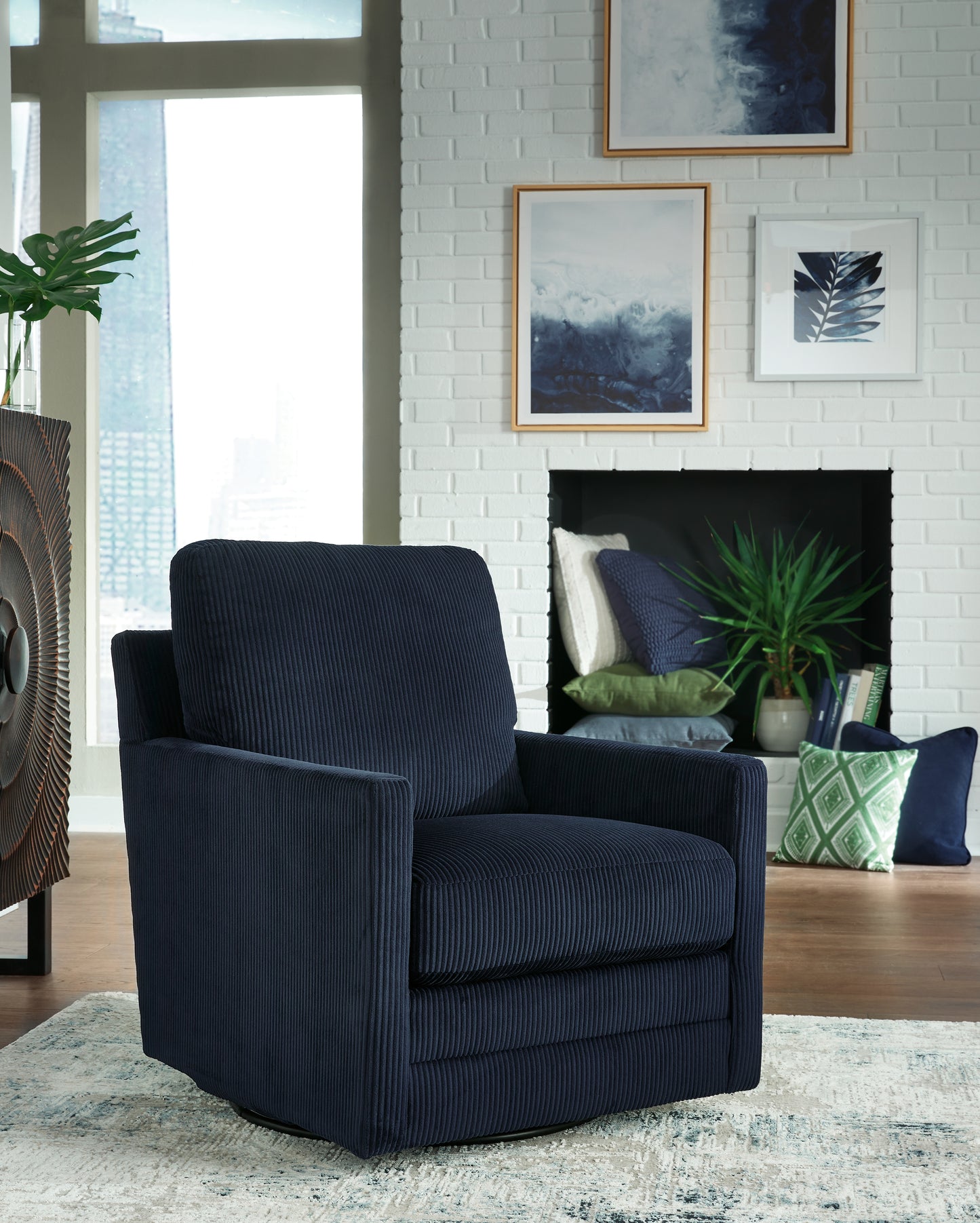 Bradenton Furniture Outlet - Ashley Furniture - Icaman Swivel Accent Chair - Swivel Accent Chair / Navy - A3000727