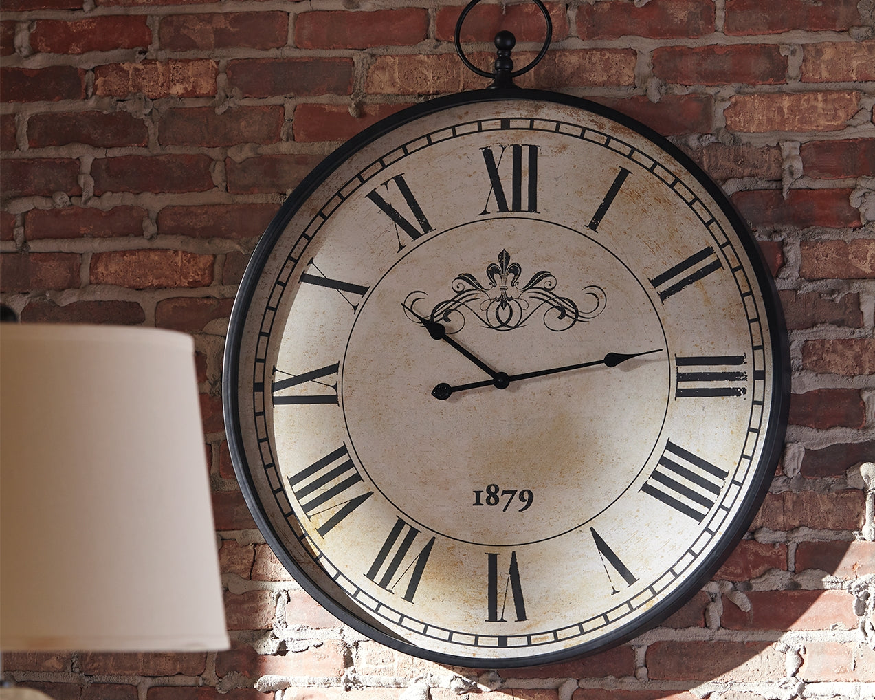Bradenton Furniture Outlet - Ashley Furniture - Augustina Wall Decor - Wall Clock / Antique Black - A8010110