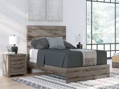 Bradenton Furniture Outlet - Ashley Furniture - Graystorm Bedroom - Full Panel Bed / Brown Gray - PCB2405B13