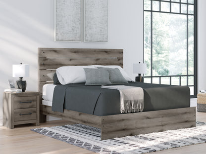 Bradenton Furniture Outlet - Ashley Furniture - Graystorm Bedroom - King Panel Bed / Brown Gray - PCB2405B8