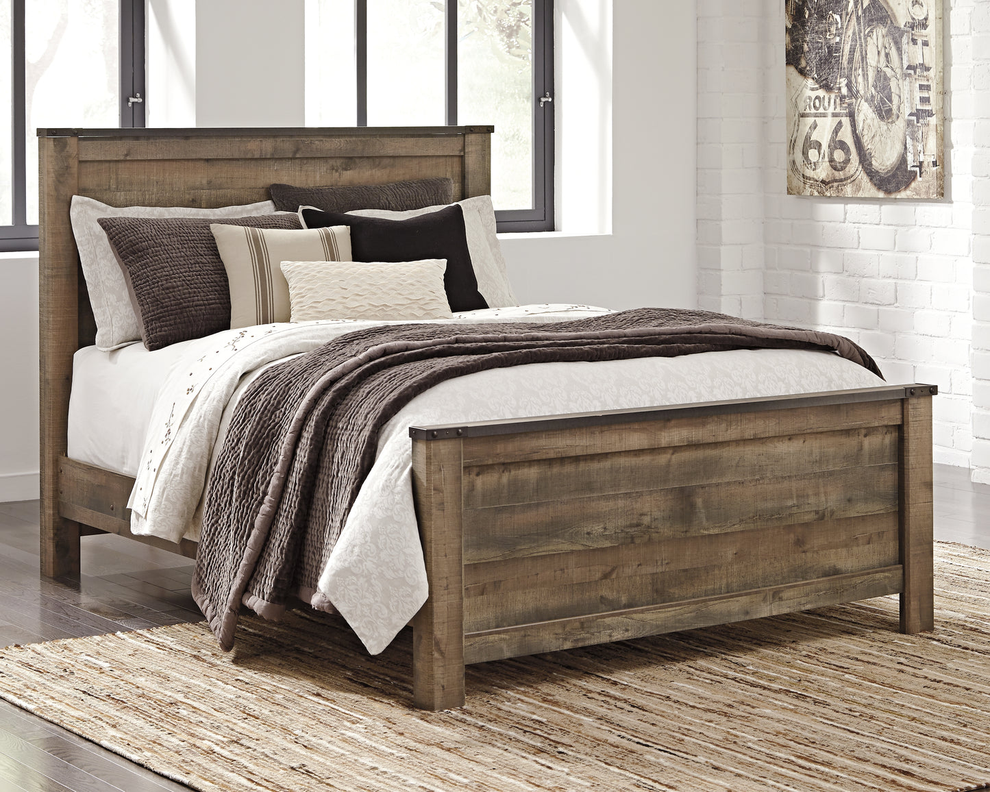 Bradenton Furniture Outlet - Ashley Furniture - Trinell Bedroom - Queen Panel Bed / Brown - B446B11