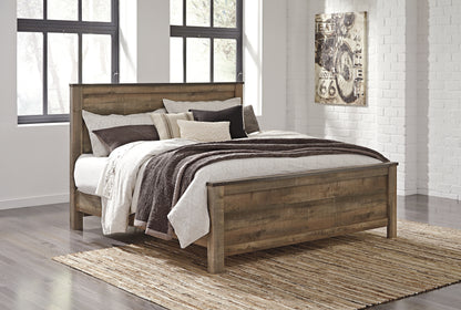 Bradenton Furniture Outlet - Ashley Furniture - Trinell Bedroom - King Panel Bed / Brown - B446B23