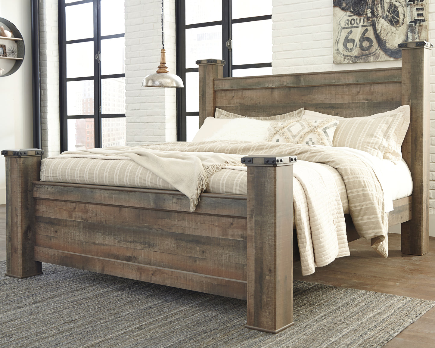 Bradenton Furniture Outlet - Ashley Furniture - Trinell Bedroom - King Poster Bed / Brown - B446B45