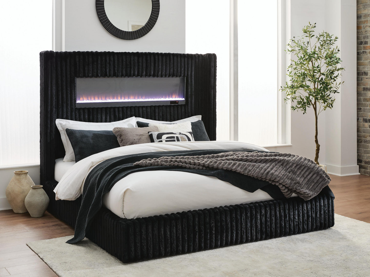 Bradenton Furniture Outlet - Ashley Furniture - Tayleena Bedroom - Queen Upholstered Bed with Fireplace and Wireless Audio / Black - PCB620B1
