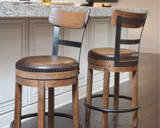 Bradenton Furniture Outlet - Ashley Furniture - Pinnadel Dining Room - Bar Height Bar Stool (Set of 2) / Grayish Brown - D542-130X2