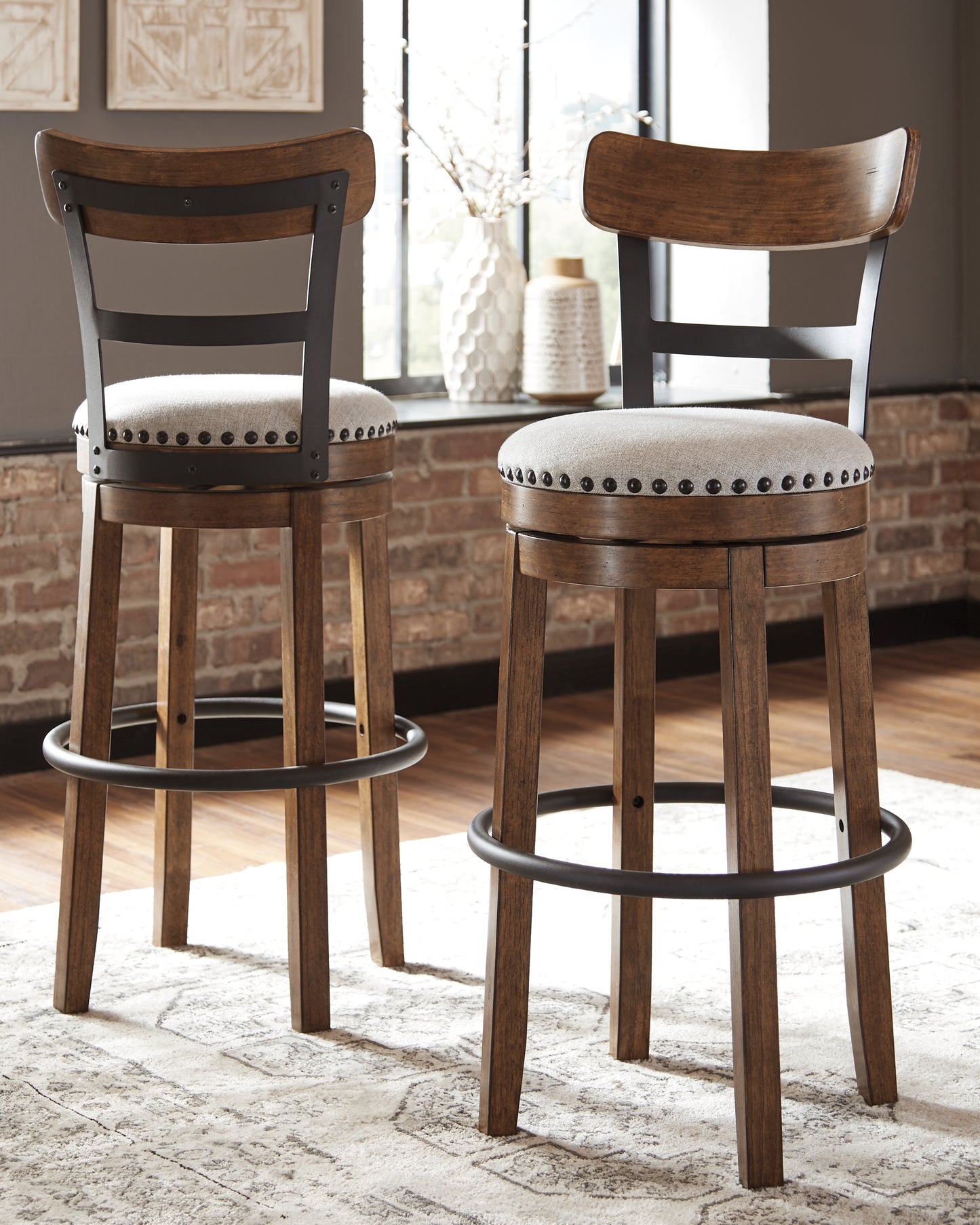 Bradenton Furniture Outlet - Ashley Furniture - Valebeck Dining Room - Tall UPH Swivel Barstool(1/CN) / Brown - D546-430
