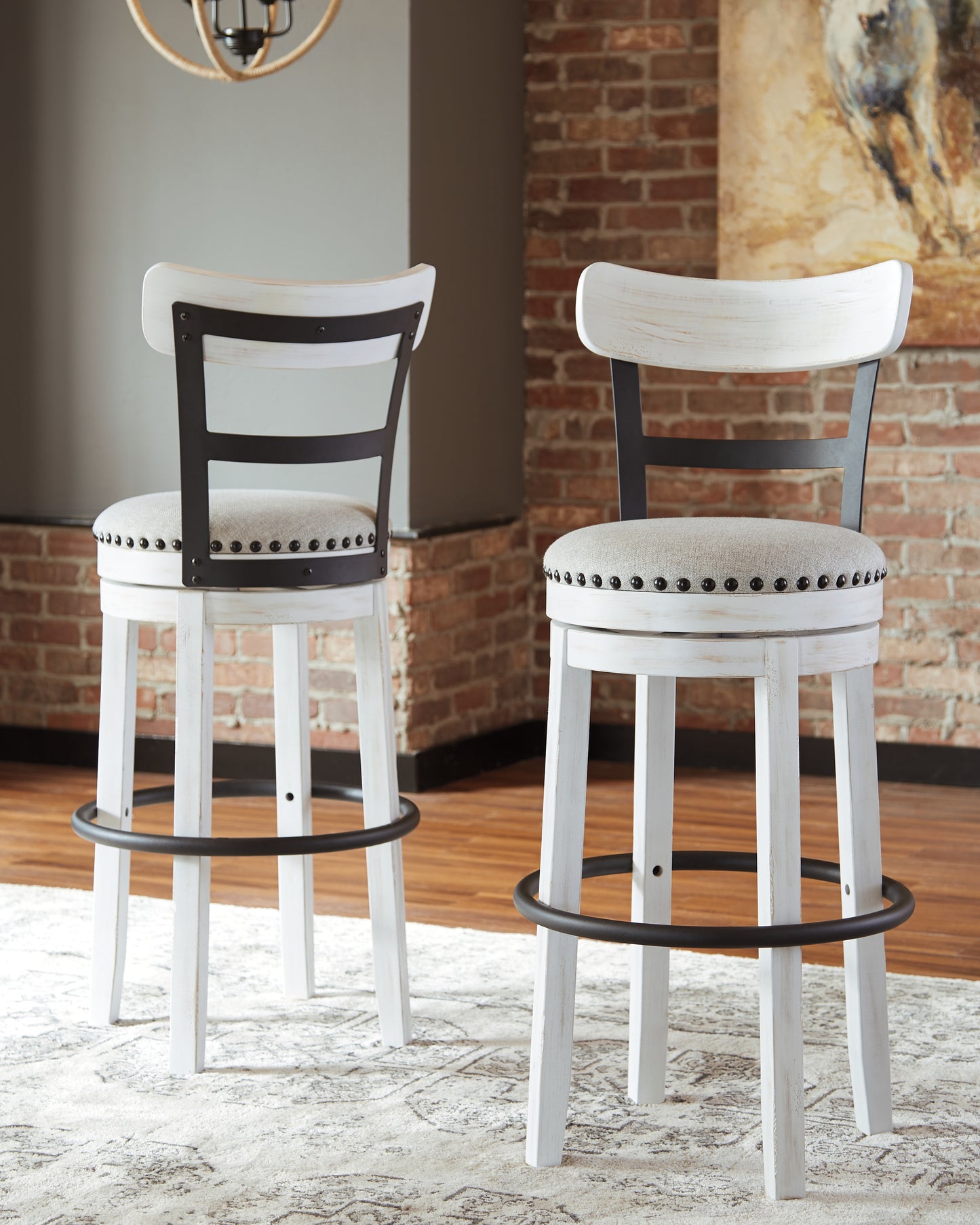 Bradenton Furniture Outlet - Ashley Furniture - Valebeck Dining Room - Tall UPH Swivel Barstool(1/CN) / White - D546-530