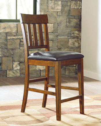 Bradenton Furniture Outlet - Ashley Furniture - Ralene Dining Room - Counter Height Bar Stool (Set of 2) / Medium Brown - D594-124X2