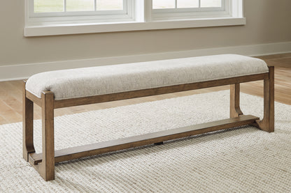 Bradenton Furniture Outlet - Ashley Furniture - Cabalynn Dining Room - Large UPH Dining Room Bench / Oatmeal/Light Brown - D974-00