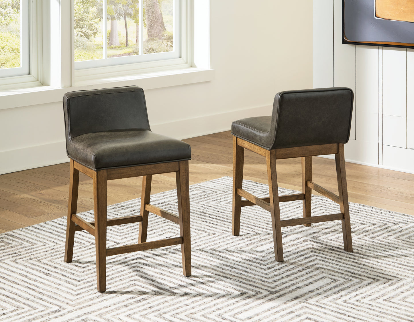 Bradenton Furniture Outlet - Ashley Furniture - Cabalynn Dining Room - Counter Height Barstool (Set of 2) / Light Brown - D974-124X2