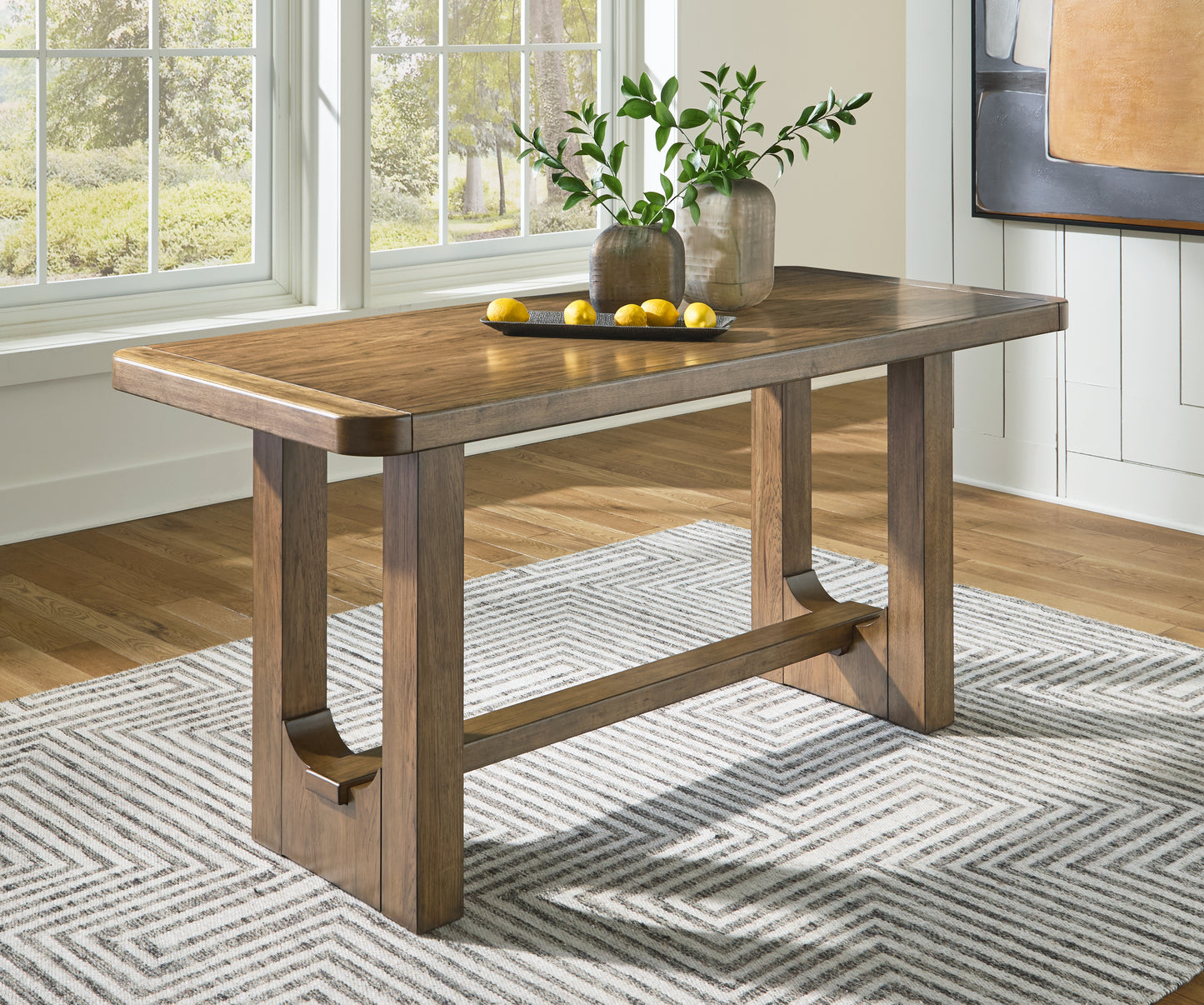 Bradenton Furniture Outlet - Ashley Furniture - Cabalynn Dining Room - RECT Dining Room Counter Table / Light Brown - D974-13