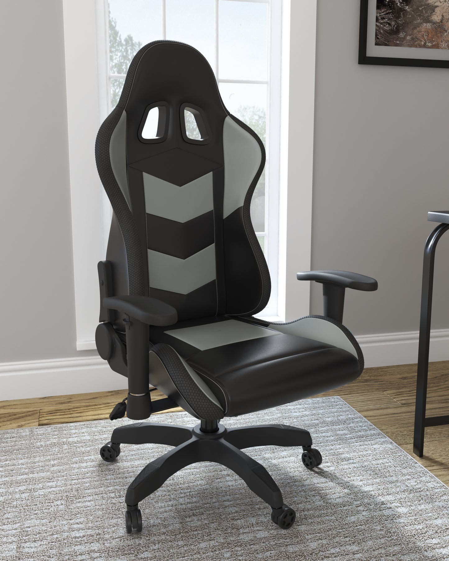Bradenton Furniture Outlet - Ashley Furniture - Lynxtyn Desk Chair - Home Office Swivel Desk Chair / Black/Gray - H400-09A