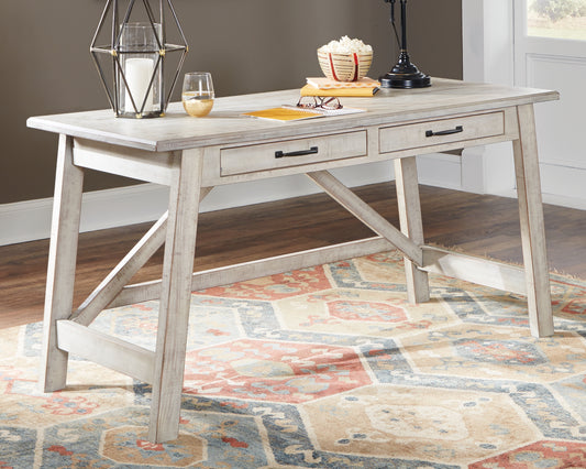 Bradenton Furniture Outlet - Ashley Furniture - Carynhurst Office Desk - Home Office Large Leg Desk / Whitewash - H755-44