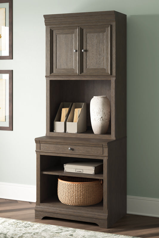 Bradenton Furniture Outlet - Ashley Furniture - Janismore Bookcase - Bookcase / Weathered Gray - H776H7