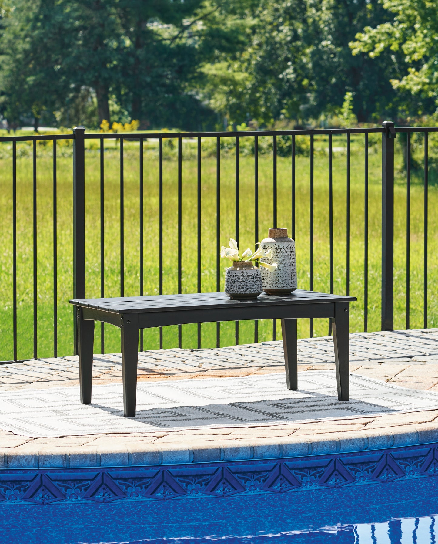 Bradenton Furniture Outlet - Ashley Furniture - Hyland wave Outdoor - Rectangular Cocktail Table / Black - P108-701
