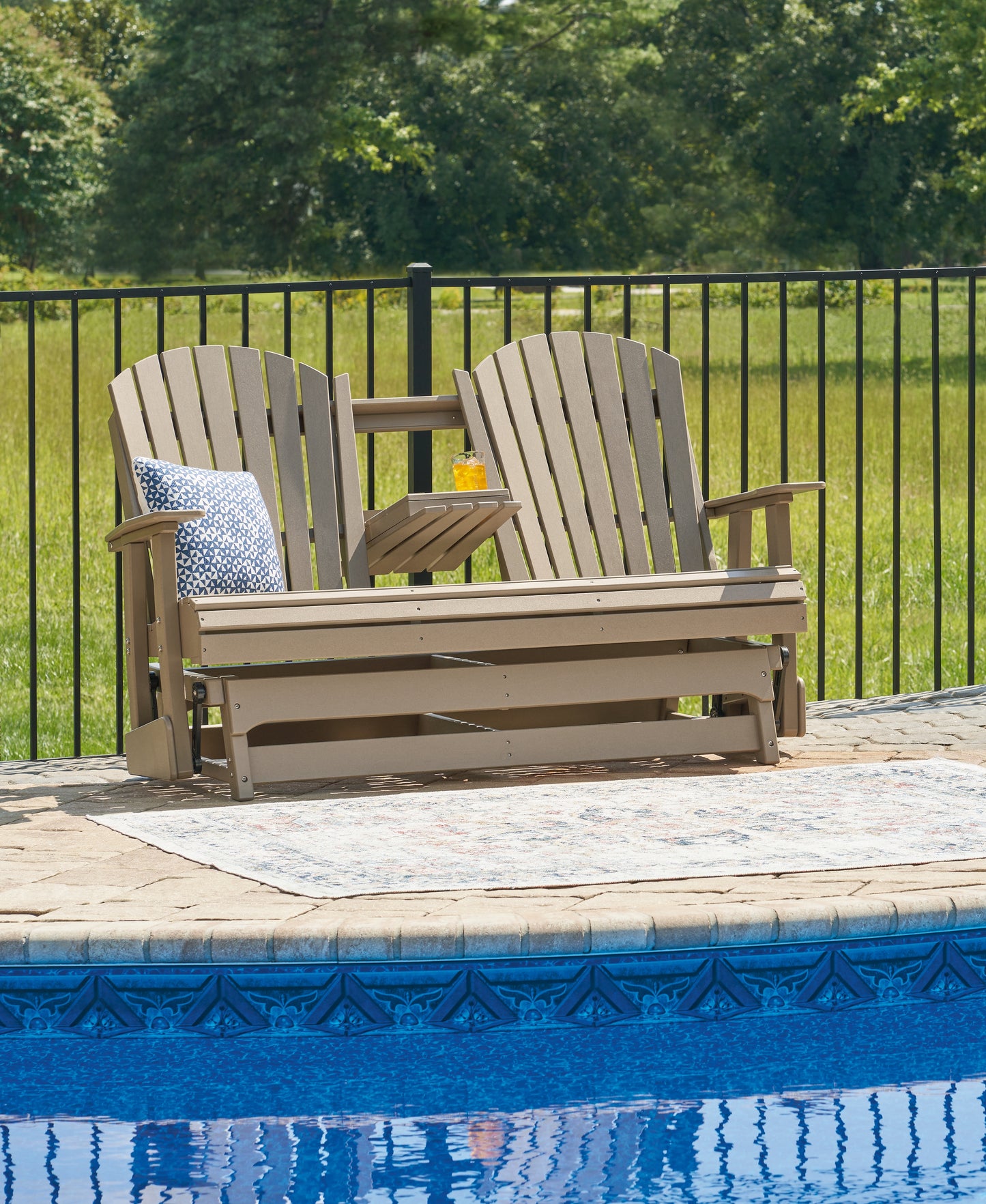 Bradenton Furniture Outlet - Ashley Furniture - Hyland wave Outdoor - Rectangular Cocktail Table / Black - P108-701