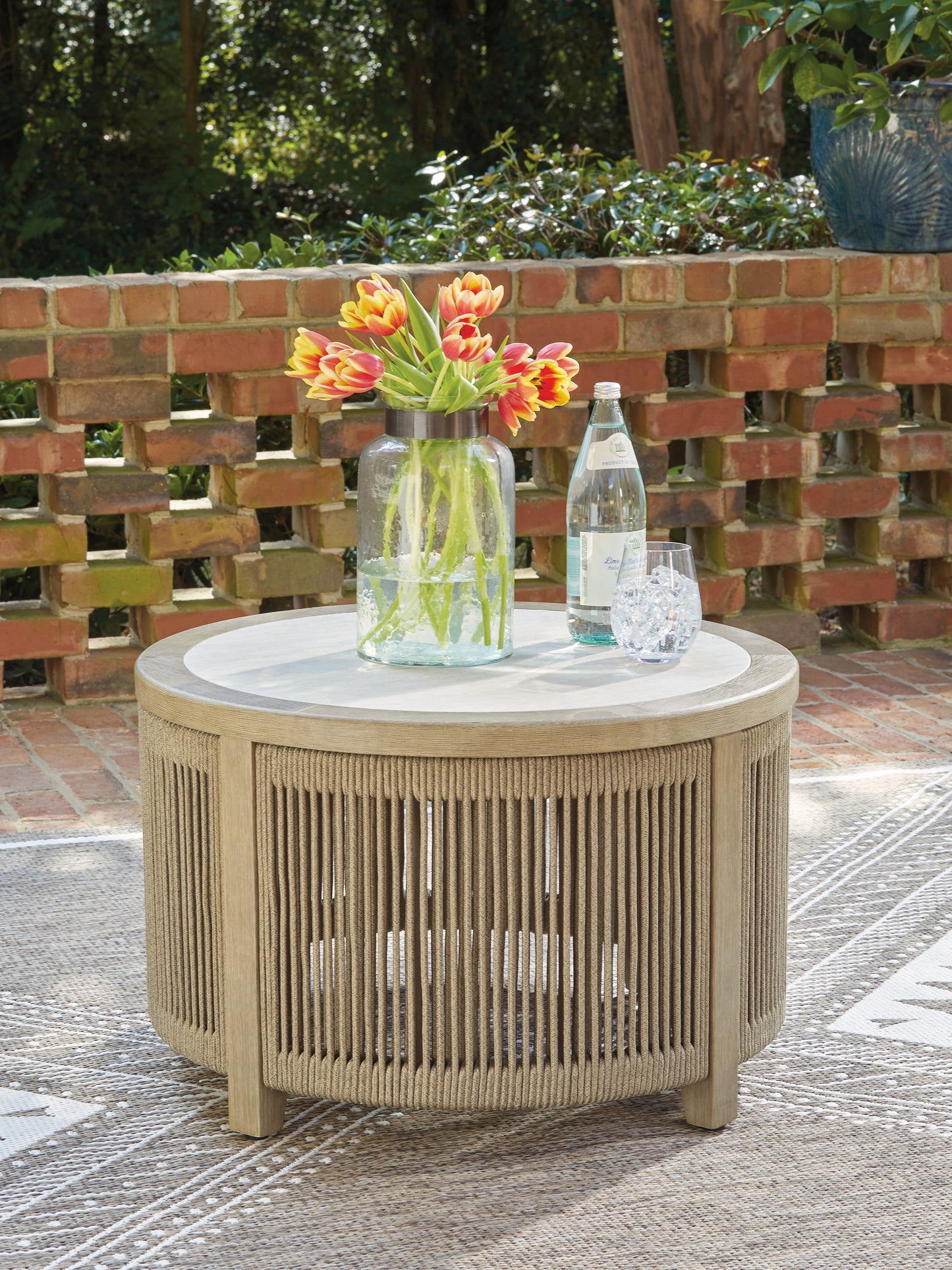 Bradenton Furniture Outlet - Ashley Furniture - Spooners Cove Outdoor - Round Cocktail Table / Beige - PCP469-708