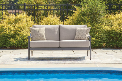 Bradenton Furniture Outlet - Ashley Furniture - Ocean Beach Outdoor - Loveseat w/Cushion / Gray - PCP510-835